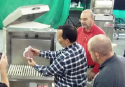 Employees inspecting meat packaging